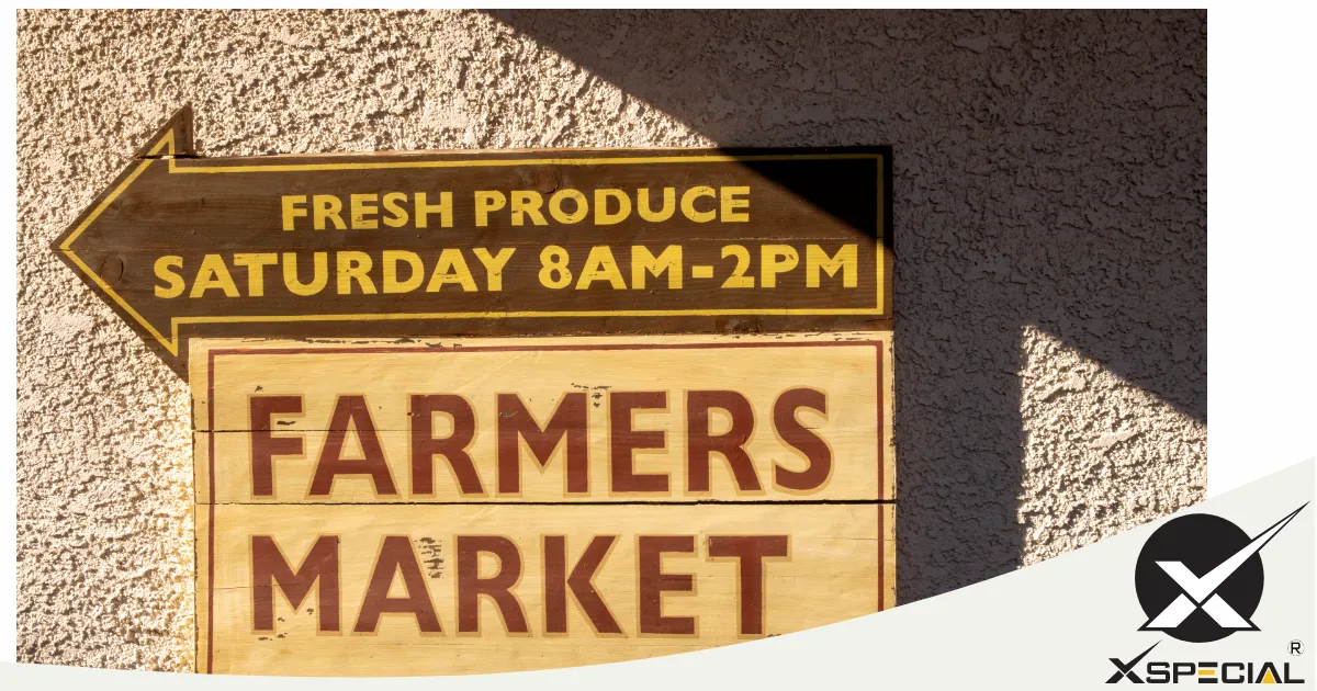 A sign advertising fresh produce for meat lovers and foodies, featuring Blade Meat Tenderizers.